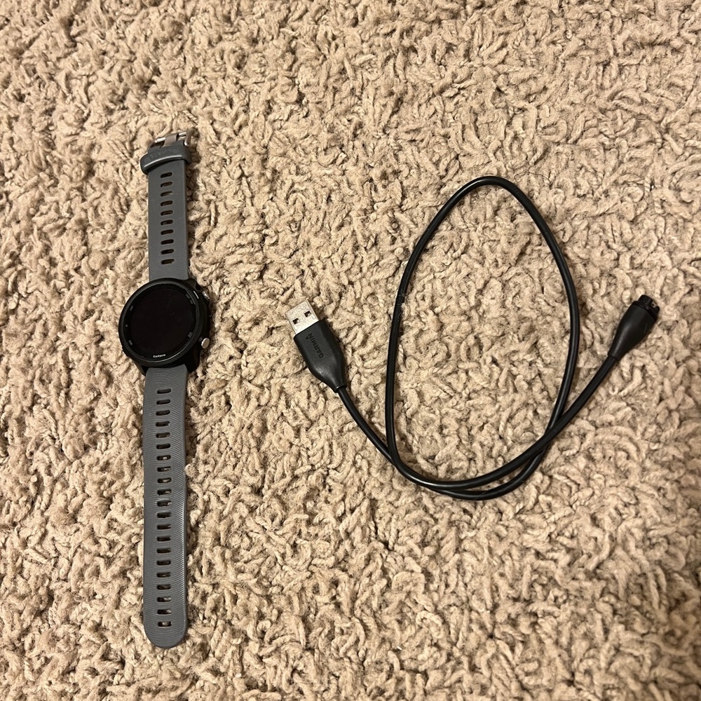 Garmin 245 forerunner great condition normal use no damage.